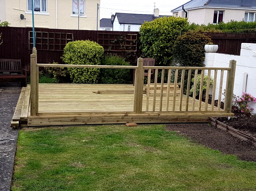 After – finished deck with railing